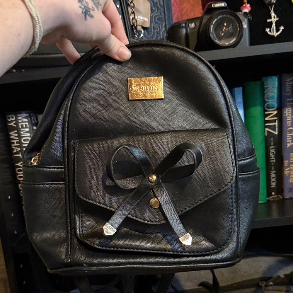 Black Leather Backpack With Bow - image 1